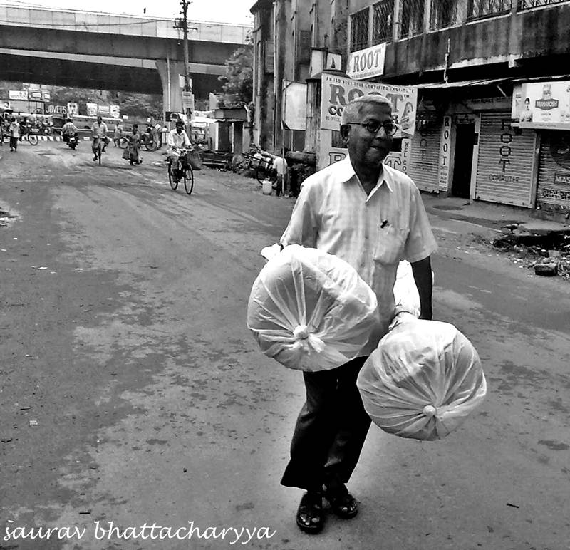 © Saurav Bhattacharyya - A man with his load