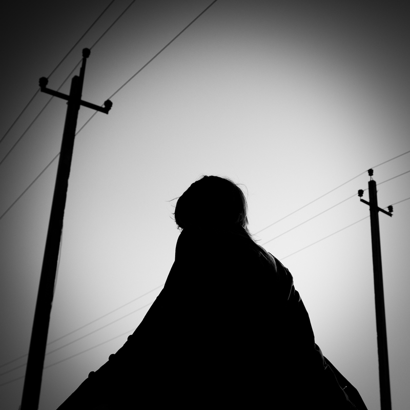 © Oleg Mansurov - Figure in a field