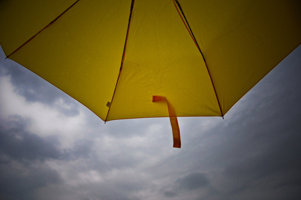 © Maria Zak - No rain under yellow umbrella